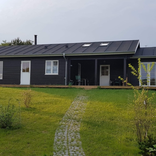 Lægning af nyt tagpap på et sommerhus i Odsherred Kommune